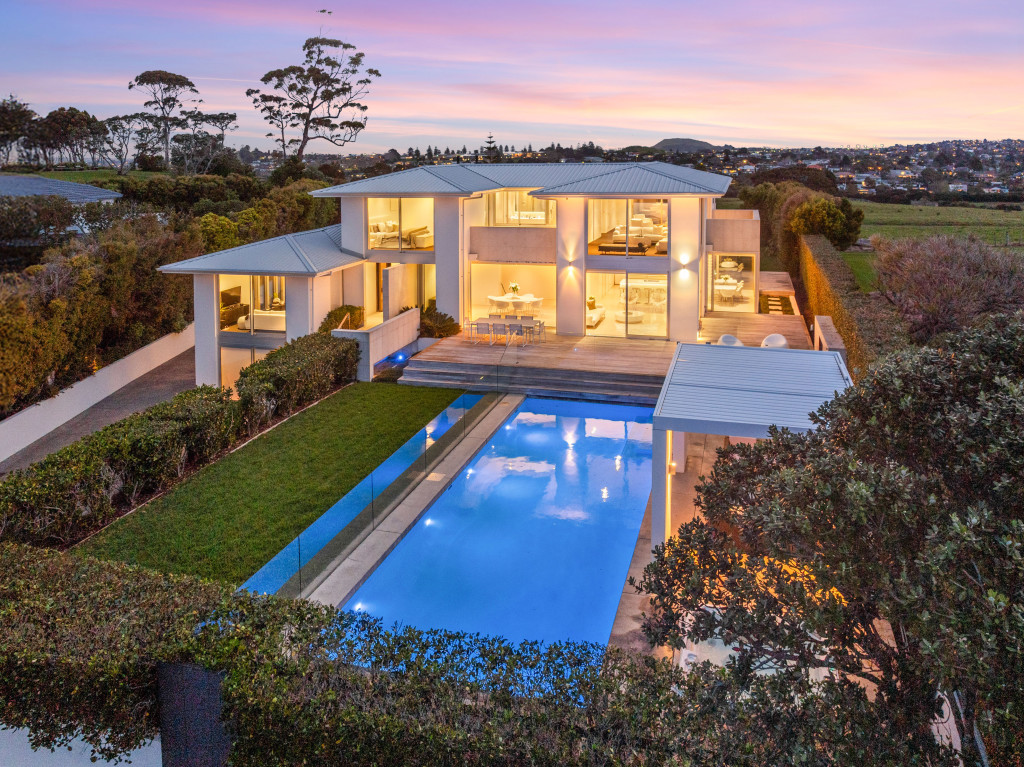 Exterior of Summit Manor luxury accommodation Auckland with pool and ocean views